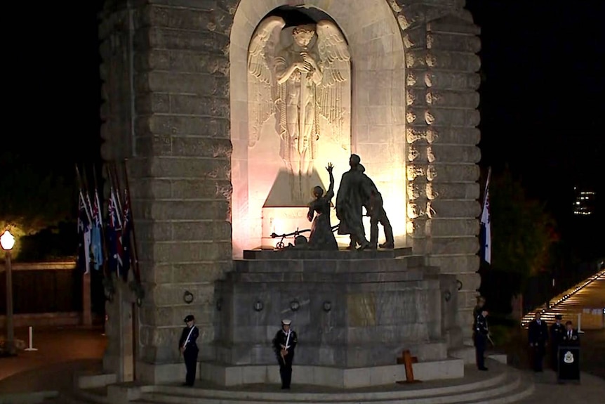 A war memorial illuminated on Anzac Day.