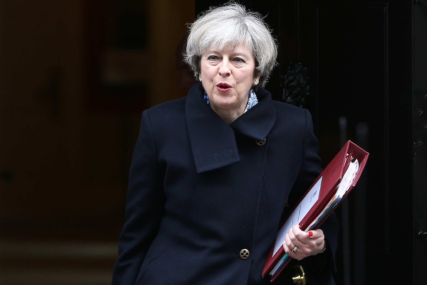Britain's Prime Minister Theresa May leaves Downing Street in London.
