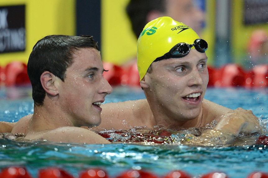 Fraser-Holmes celebrates with McEvoy at Pan Pacs