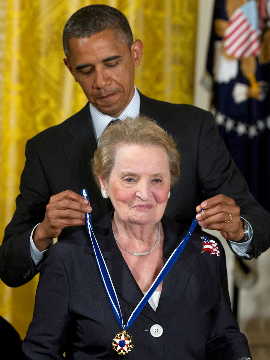 President Barack Obama awards Madeleine Albright the Presidential Medal of Freedom in the East Room of the White House.