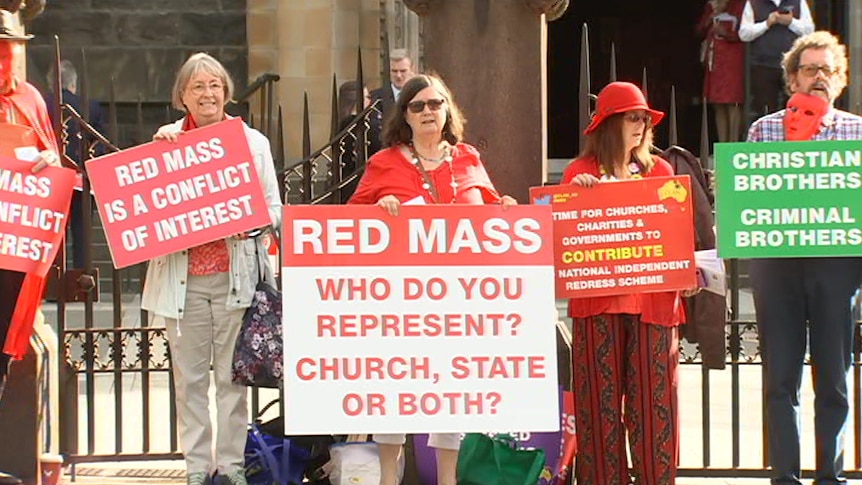 Protesters says the annual Red Mass is a conflict of interest.