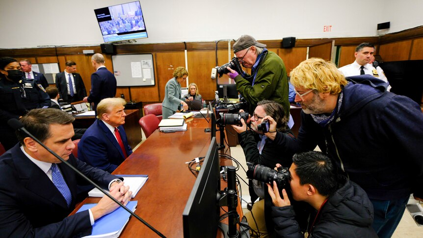 Court photographers take Donald Trump's photo in court