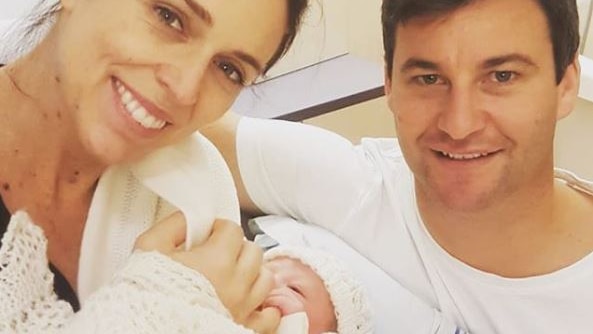 Jacinda, Clarke with their baby in the hospital