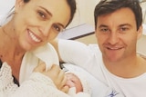 Jacinda, Clarke with their baby in the hospital