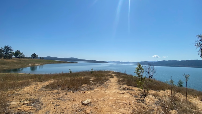 Winenhoe Dam on a sunny day in dry condition as water levels fall