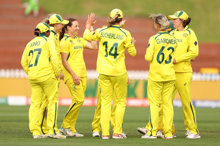 Australia celebrates taking a wicket against Bangaldesh in the Women's Cricket World Cup.