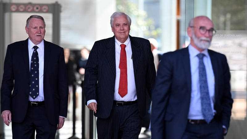 Businessman and former federal MP Clive Palmer leaves court.