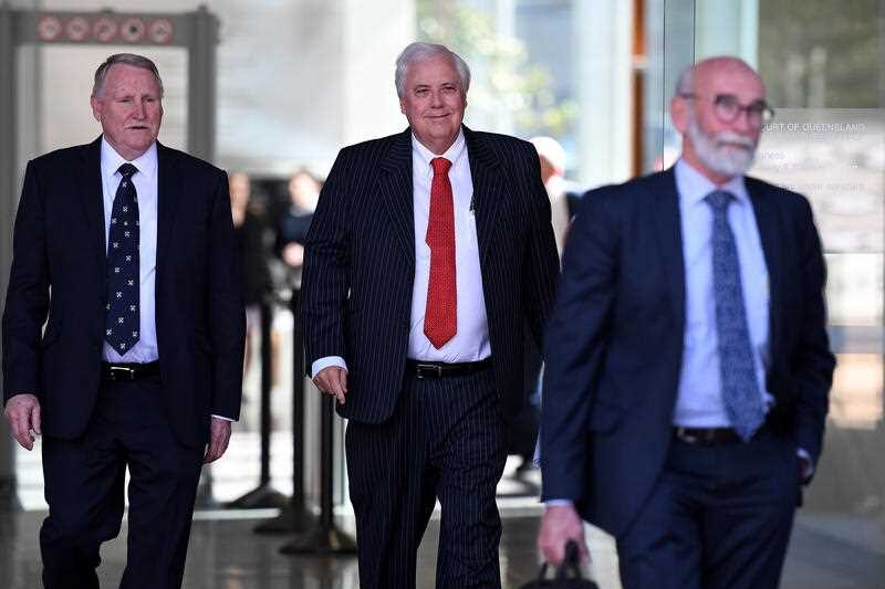 Businessman and former federal MP Clive Palmer leaves court.