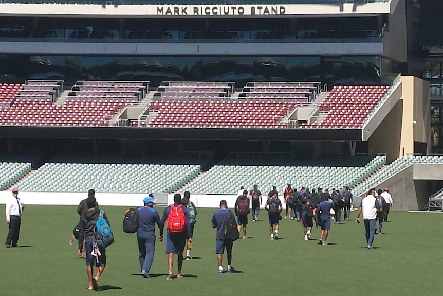 The Indian team leaves training after being told of Phillip Hughes's death