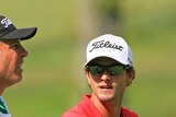 Scott talks things over with caddie Williams