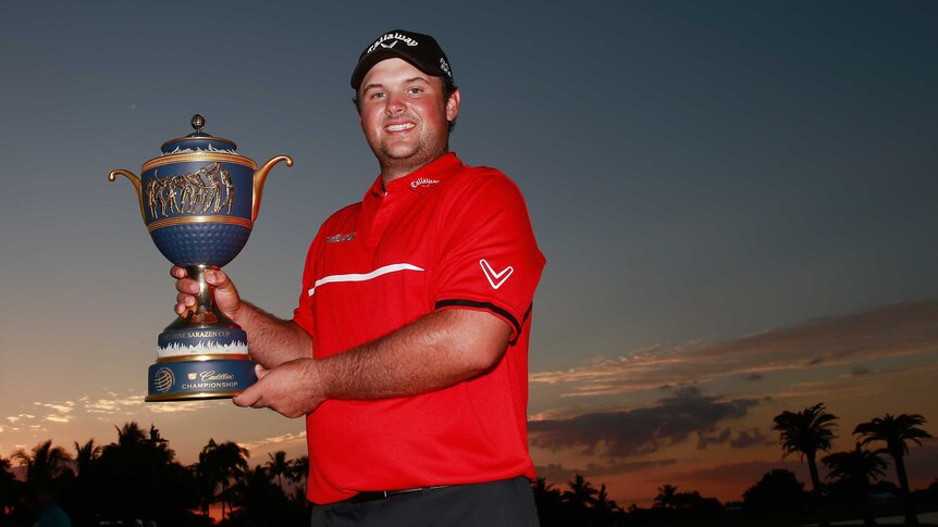 Patrick Reed with his first WGC trophy