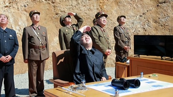 North Korean leader Kim Jong-un supervising launch of the Hwasong-14 missile.