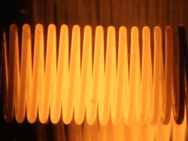 A close-up photograph of an electric light filament