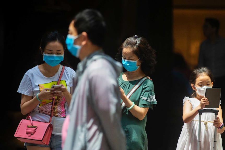 People in Sydney's CBD are seen wearing masks on January 31, 2020 in Sydney, Australia.