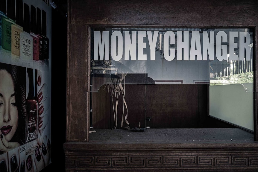 An empty money changer booth in Kuta, Bali, Indonesia.