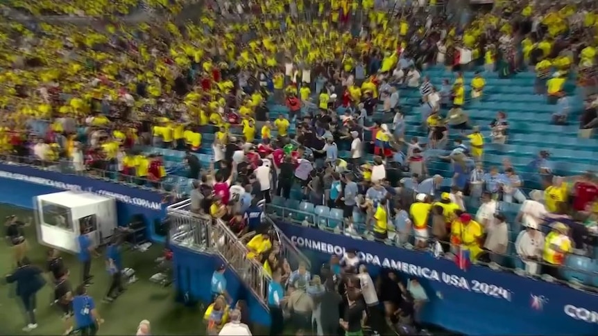 A spider cam shot of a crowd at a football match.