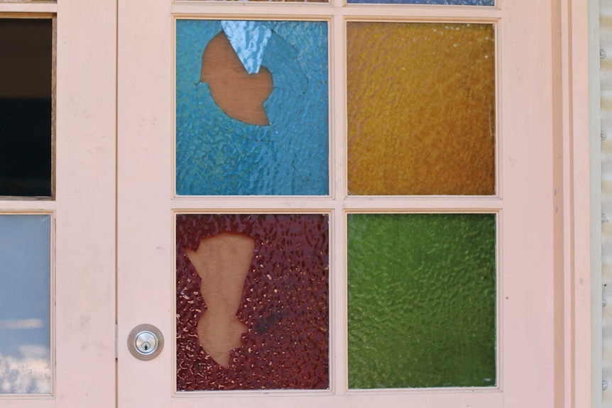 Smashed stained glass on doorway