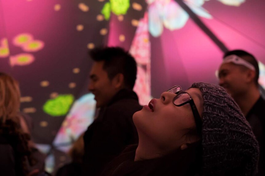 Visitors gaze upwards at the pop-up Museum of Feelings in New York City.