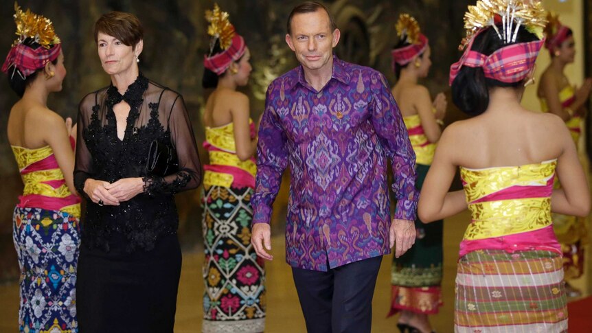Prime Minister Tony Abbott and wife Margie arrive for a gala dinner at the APEC Summit.
