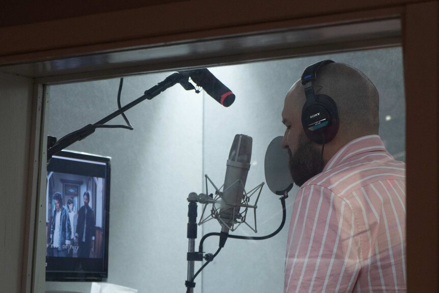 Clint Bracknell in the recording studio dubbing the role of Fan.