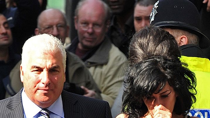 Amy Winehouse (R) and her father Mitch