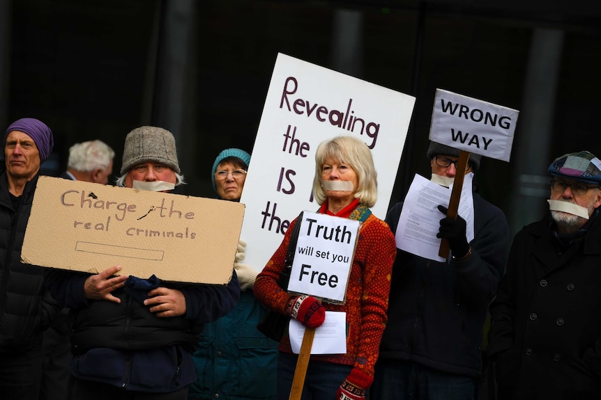 Supporters of Bernard Collaery and Witness K staged a protest outside court in Canberra earlier this month.