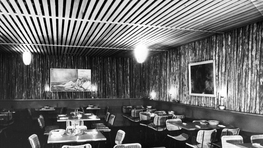 black and white photo of a restaurant