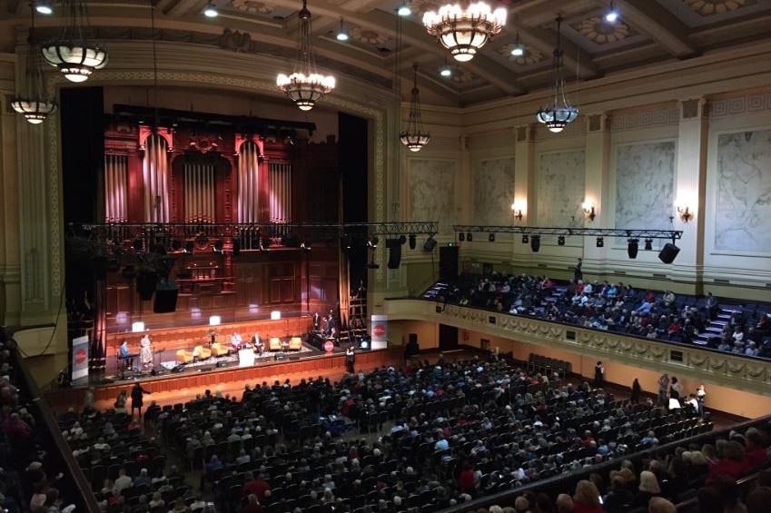 Audiences fill the inside of Melbourne Town Hall.