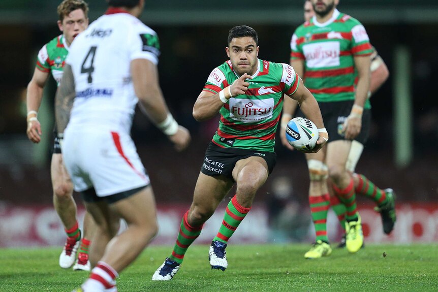 South Sydney's Dylan Walker runs with the ball against St George Illawarra