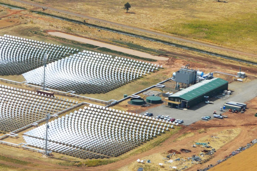 Aerial photo of a solar thermal renewable project with five large sections of solar panels