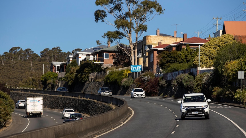 Housing overlooking the inbound lane of Hobart's Southern Outlet