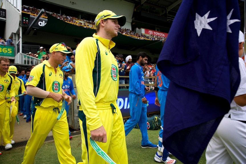 Captain Steve Smith and vice-captain David Warner lead out the Australia side