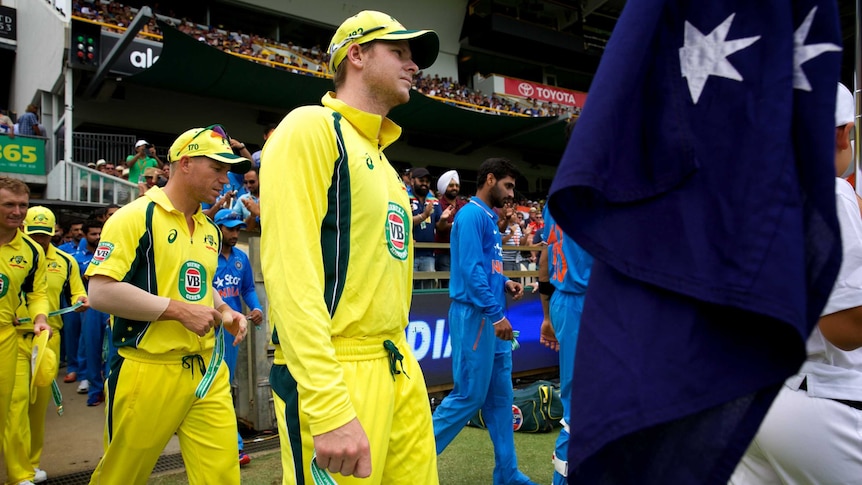 Captain Steve Smith and vice-captain David Warner lead out the Australia side