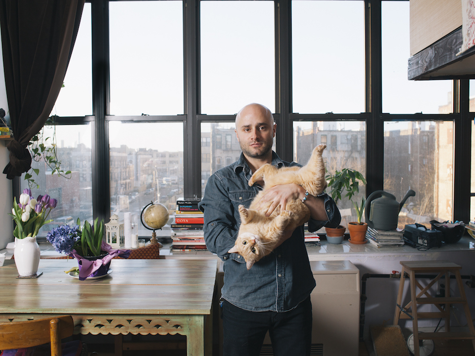 A portrait of a man and his cat by Brooklyn photographer David Williams.