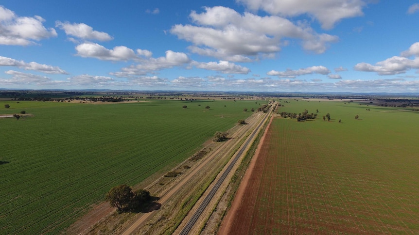 A drone shot of the Perth-to-Sydney rail line near Parkes.