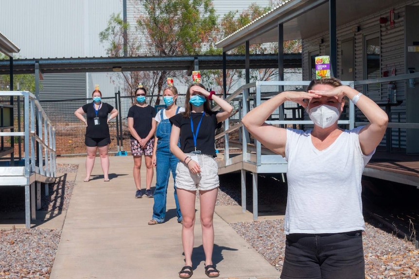 A photo of a group of girls playing a game in the Howard Springs quarantine facility.