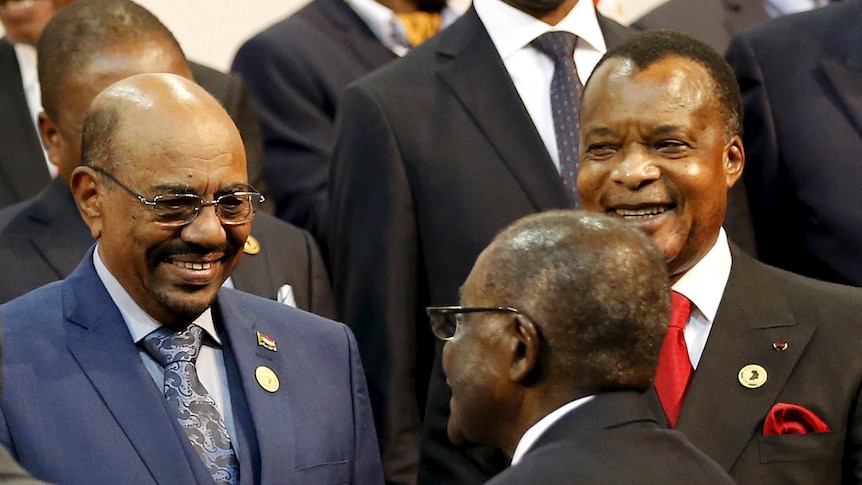 President of the Congo Republic Denis Sassou Nguesso (R) looks on as Sudan's president Omar al-Bashir