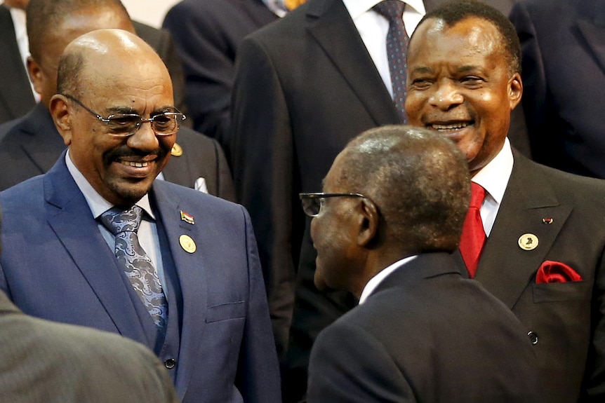 President of the Congo Republic Denis Sassou Nguesso (R) looks on as Sudan's president Omar al-Bashir