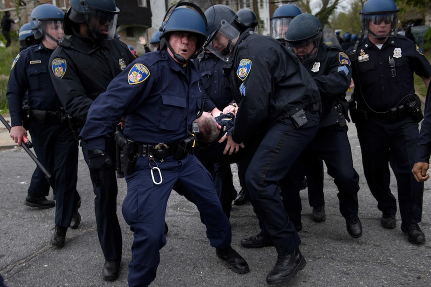 Violent street clashes erupt in Baltimore