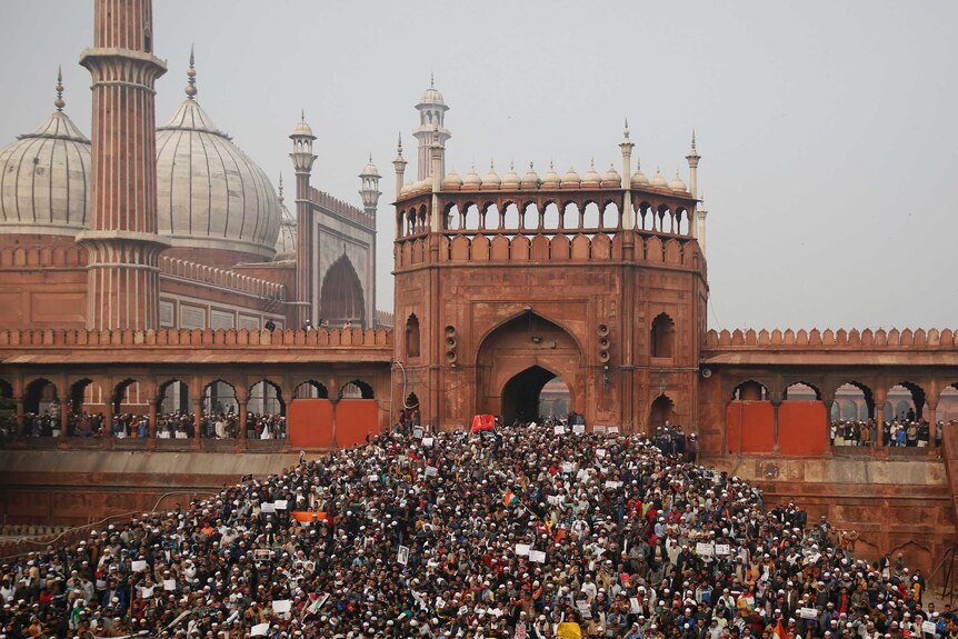 Crowds of people gather outside Jama Masjid in New Delhi