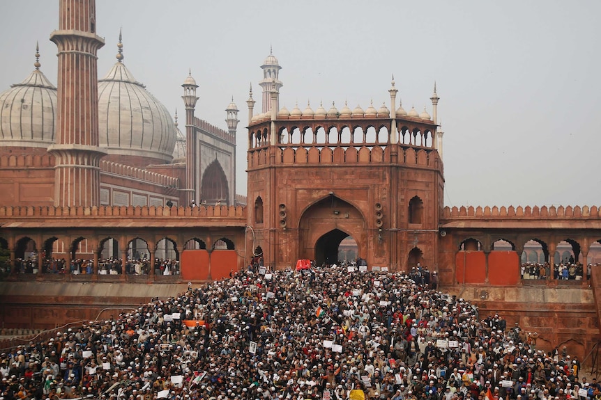 Crowds of people gather outside Jama Masjid in New Delhi