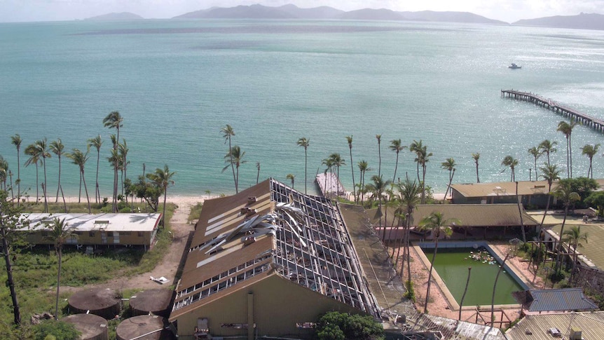 An aerial shot looking to the ocean off the cyclone damaged South Molle Island.