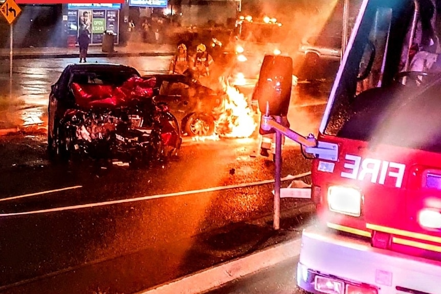 a car on fire after a crash