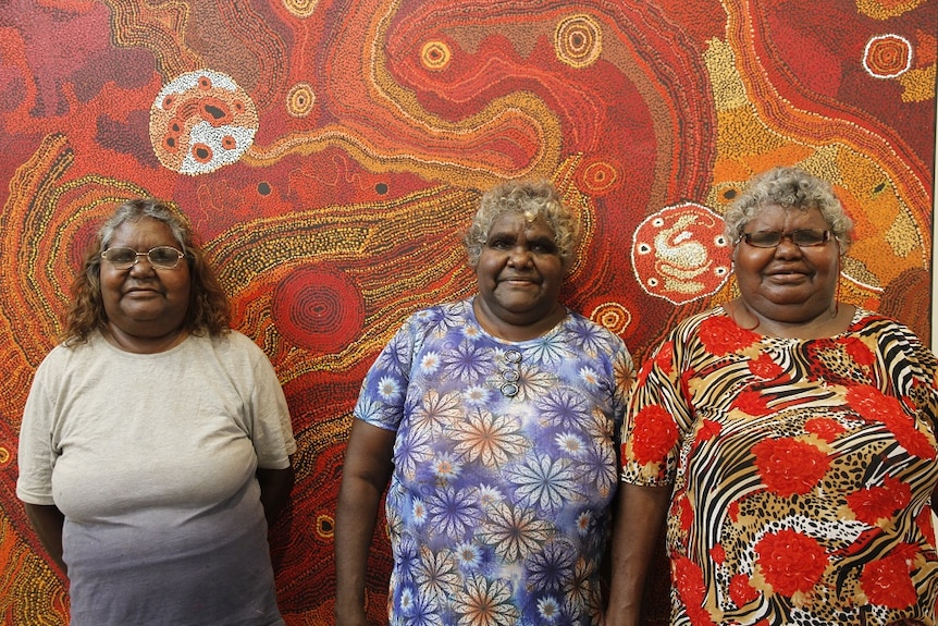 Aboriginal artists Maringka Tunkin, Freda Brady and Yaritji Tingila Young from Tjala Arts in Alice Springs