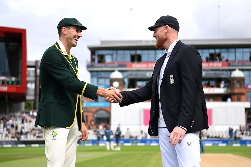 Pat Cummins shakes hands with Ben Stokes