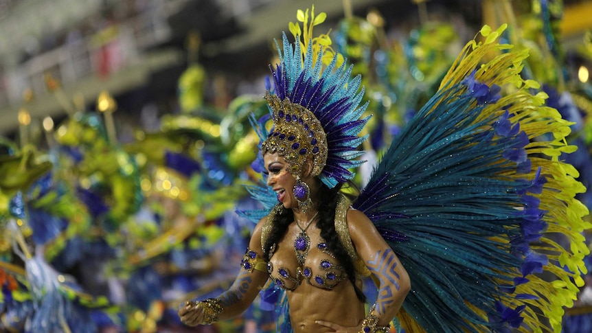 Revellers from Uniao da Ilha Samba school perform