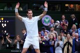 Tennis player Andy Murray stands on Centre Court at Wimbledon, with arms raised acknowledging the crowd.