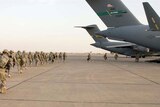 Leaving for war: reports say Barack Obama has agreed to send up to 35,000 more troops to Afghanistan.