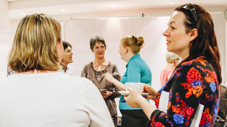 Members of all ages catch-up once a month for a meeting and to plan the group's next project.