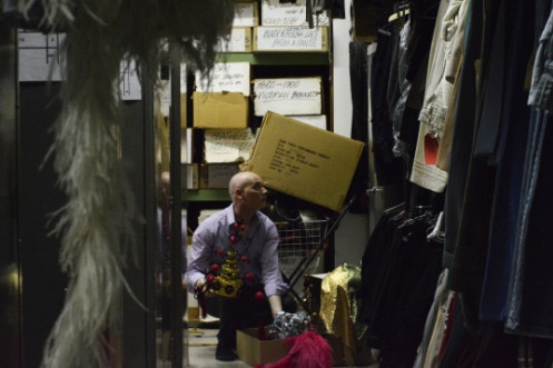 Andrew Best looks through through the wardrobe department for television shows.